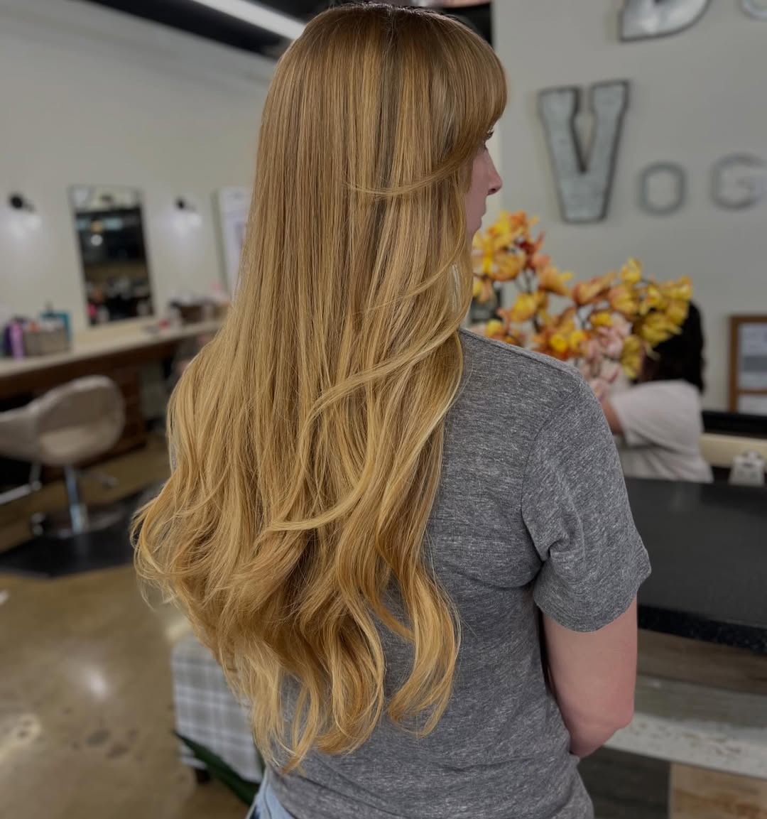 Long blonde hair with flowing layers